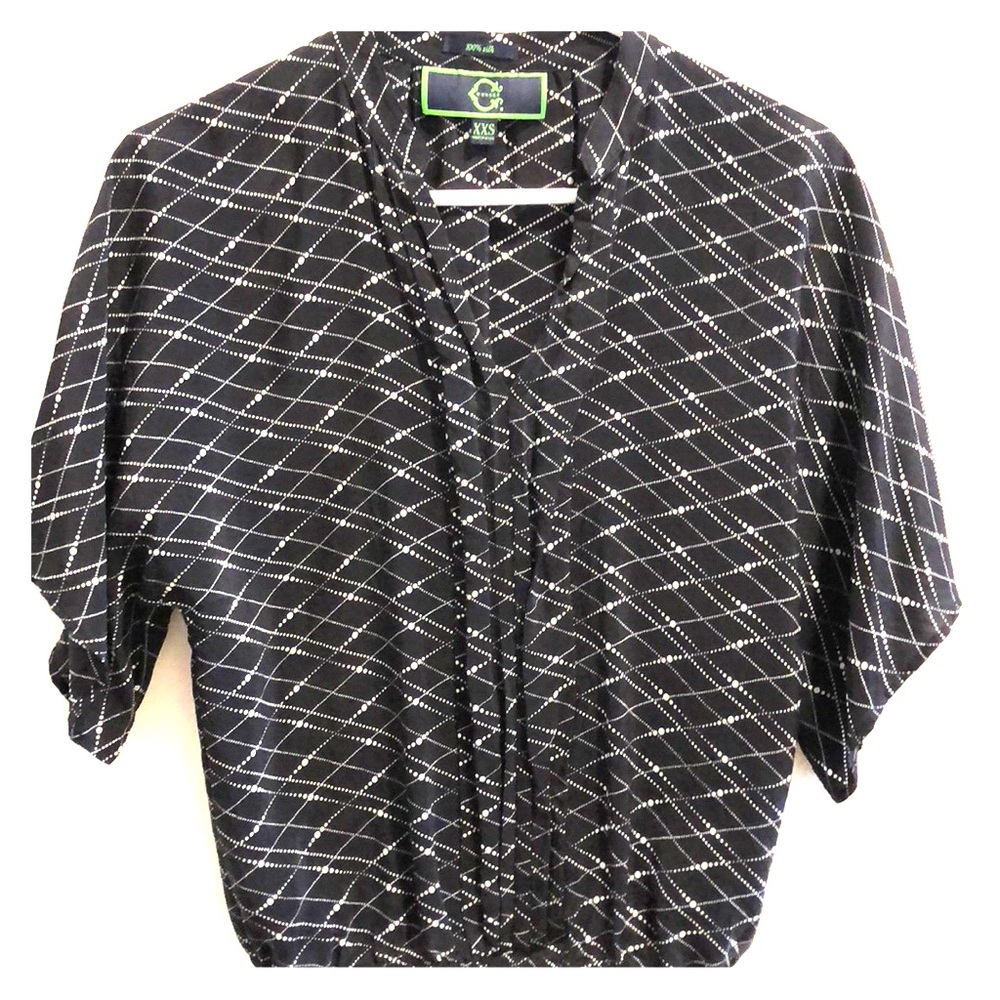 Black and white 100% silk blouse.